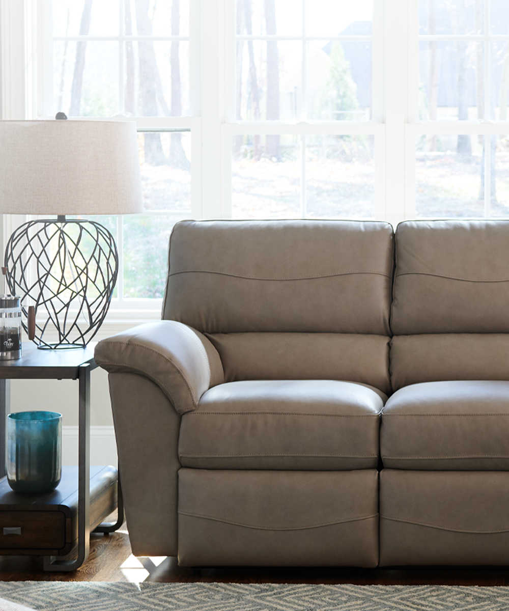 Room scene with leather cover on Reese Reclining Sofa